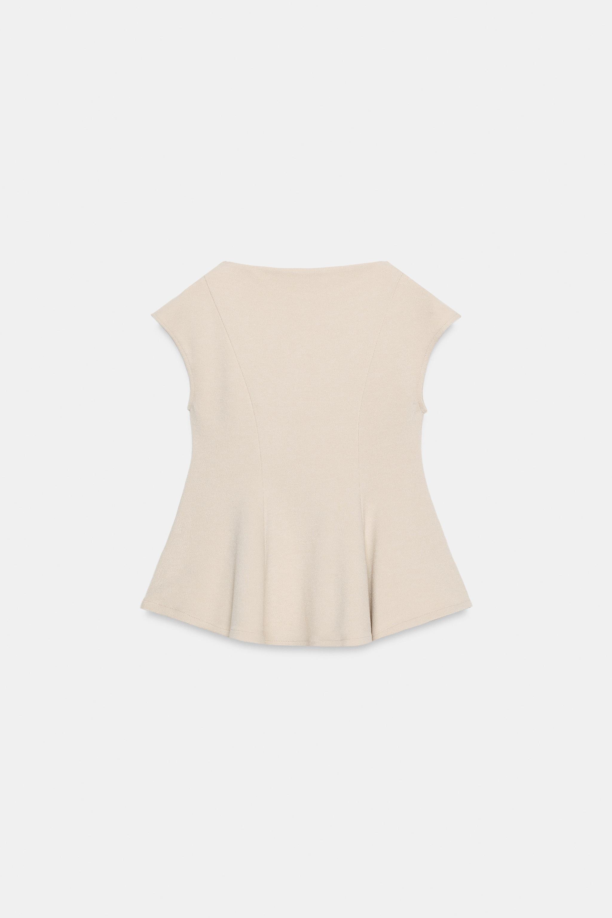 SHORT SLEEVE PIQUÉ PEPLUM TOP